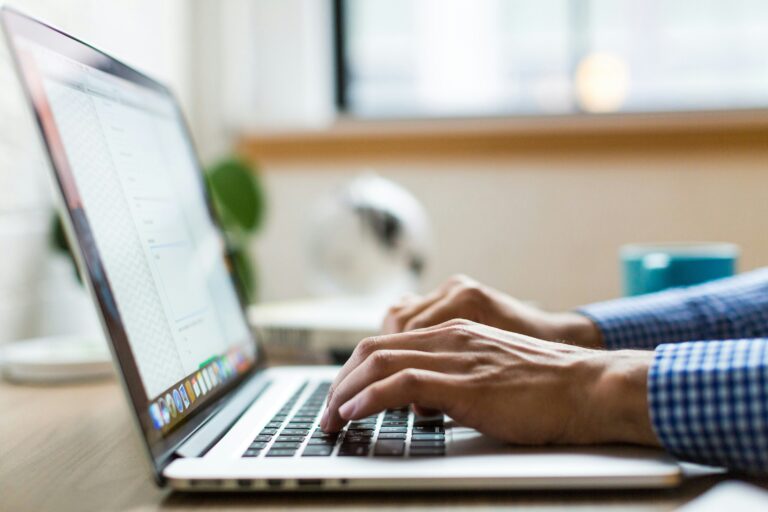 man using laptop